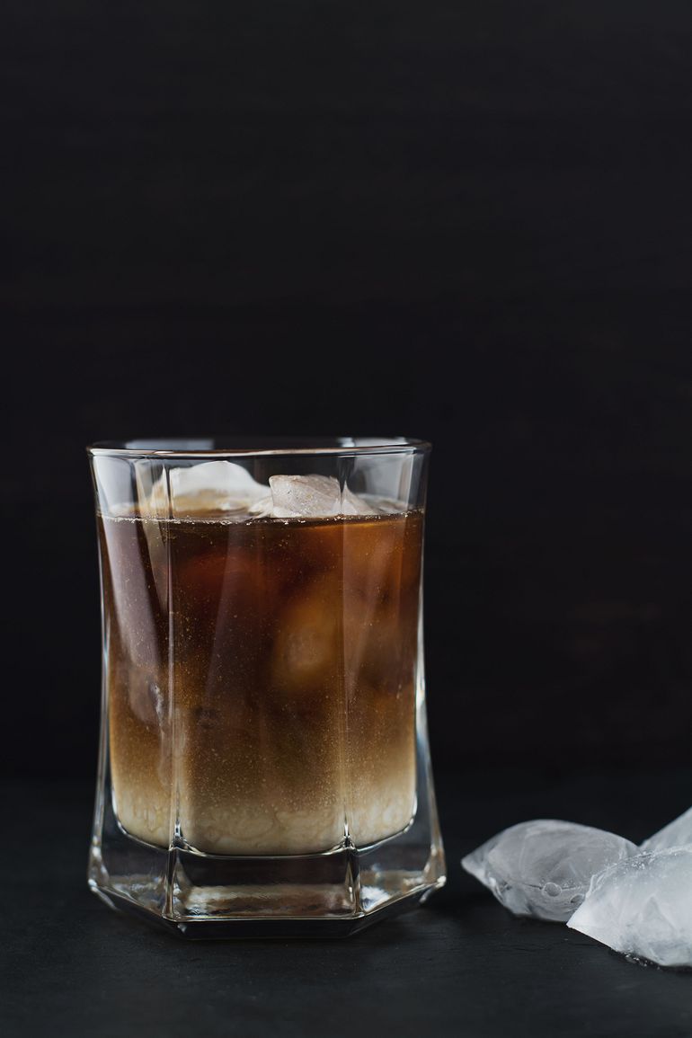 Iced coffee with ice cubes in a glass.