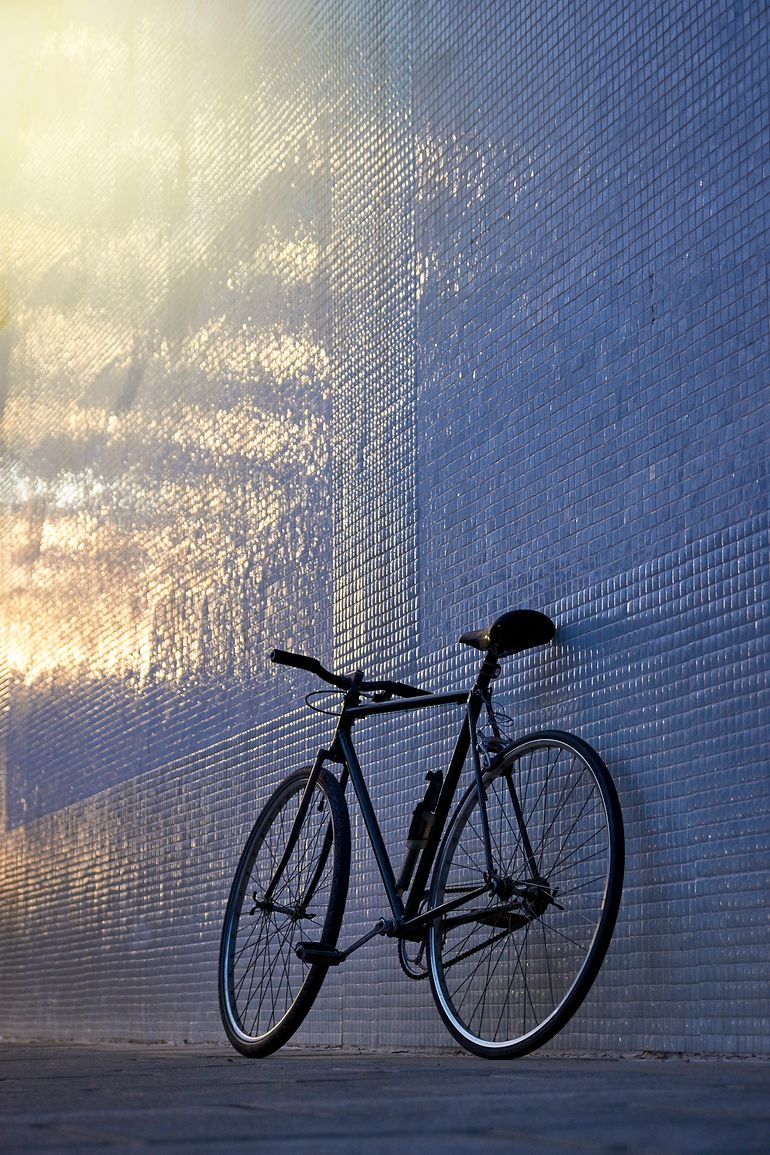 Bike against wall in glow light