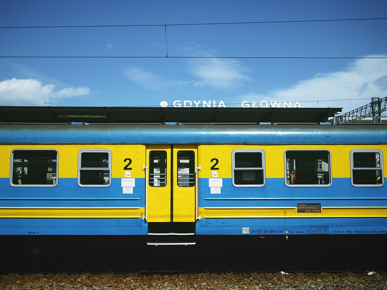 yellow train with a little bit of blue
